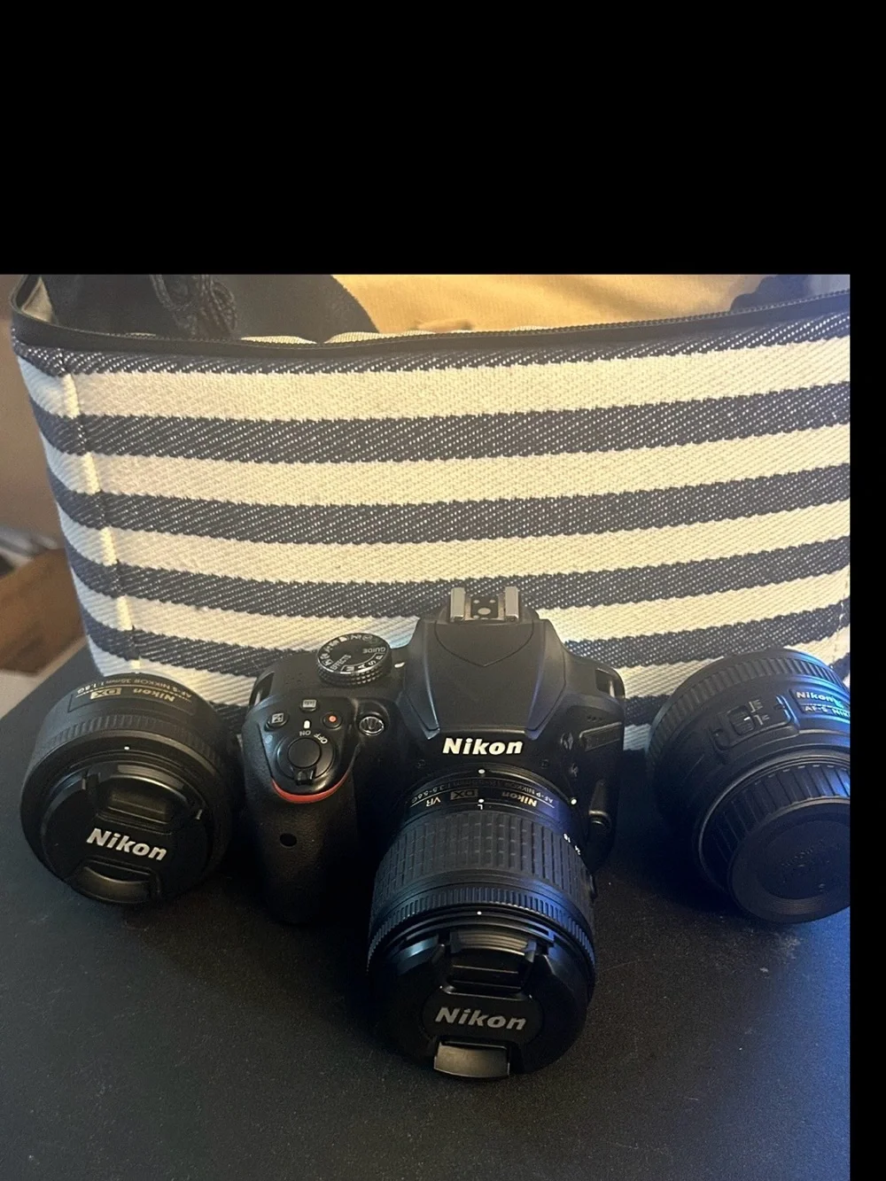 Nikon D3400 Black DSLR with Attached Nikon Lens